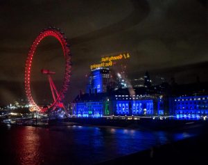 Taken from a big red bus, this place looks awesome at night!