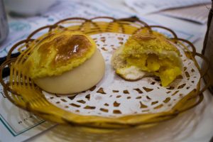 Pineapple Buns with Pineapple Custard Filling, one torn in half