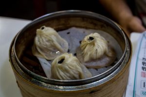 Shanghai Soup Dumplings with Black Truffle. A warm splash of soup, with an earthy finish!
